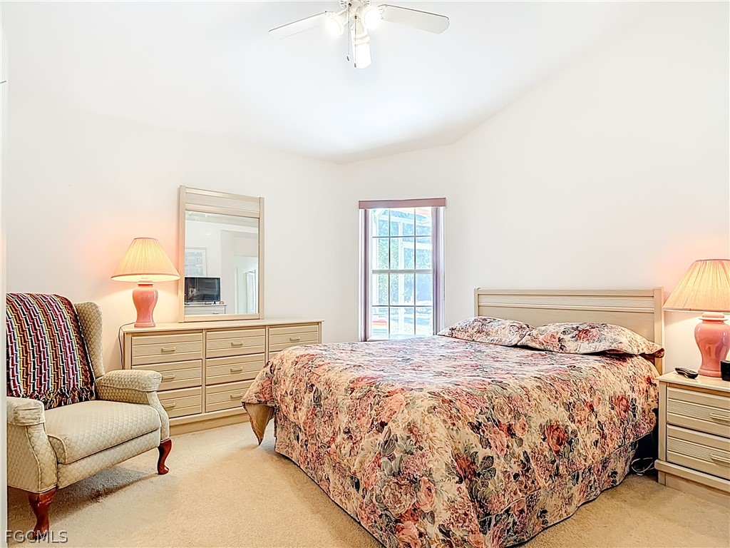 2160 Faliron Road North Fort Myers, FL 33917 - Photo 16 of 42 a bedroom with a bed and a couch