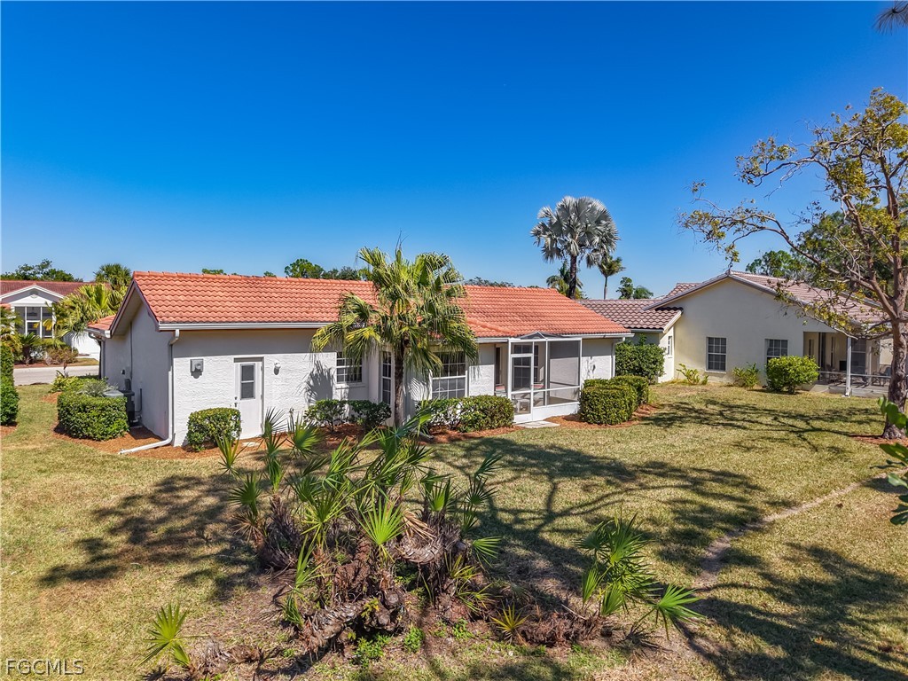2160 Faliron Road North Fort Myers, FL 33917 - Photo 28 of 42 a view of a house with a big yard