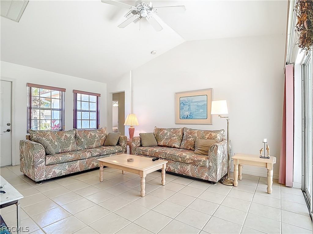 2160 Faliron Road North Fort Myers, FL 33917 - Photo 8 of 42 a living room with furniture and a window