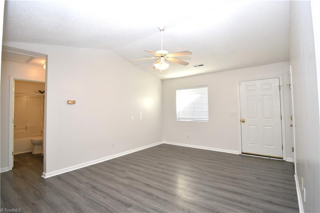 2553 Stratford Lake Road Winston-Salem, NC 27103 - Photo 4 of 19 A view of the living room from the dinning area.