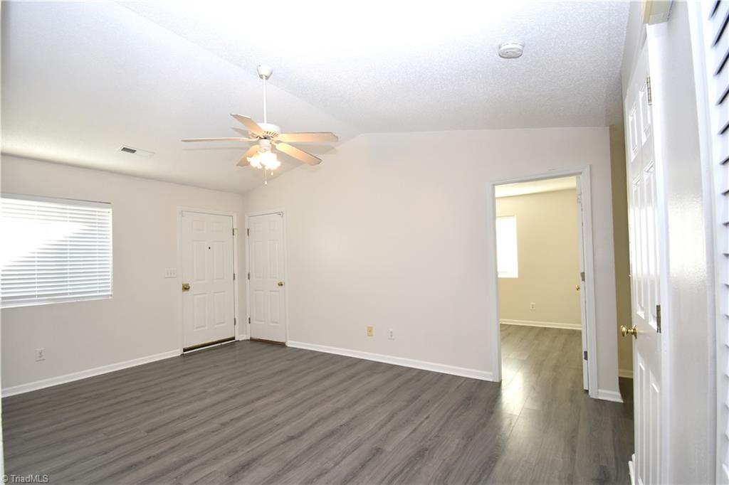 2553 Stratford Lake Road Winston-Salem, NC 27103 - Photo 5 of 19 A view of the front door/living room from the guest bedrooms.