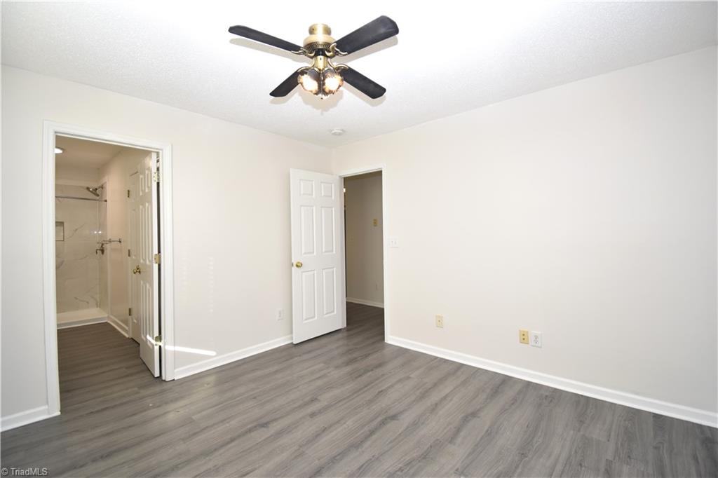 2553 Stratford Lake Road Winston-Salem, NC 27103 - Photo 9 of 19 A second view of the primary bedroom with a door to your private en-suite
