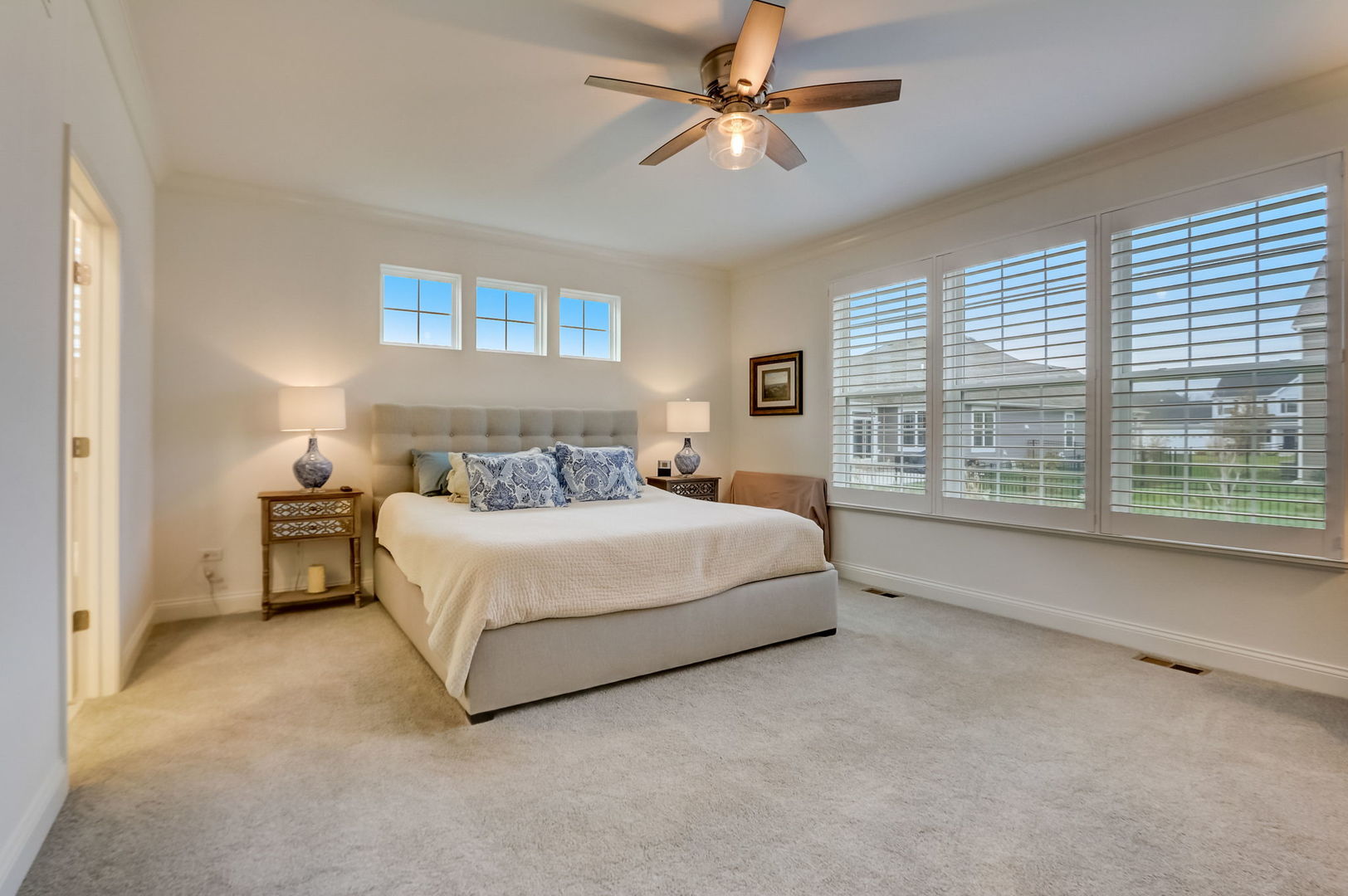 3630 Edelweiss Road Elgin, IL 60124 - Photo 12 of 47 a bedroom with a large bed and a large window