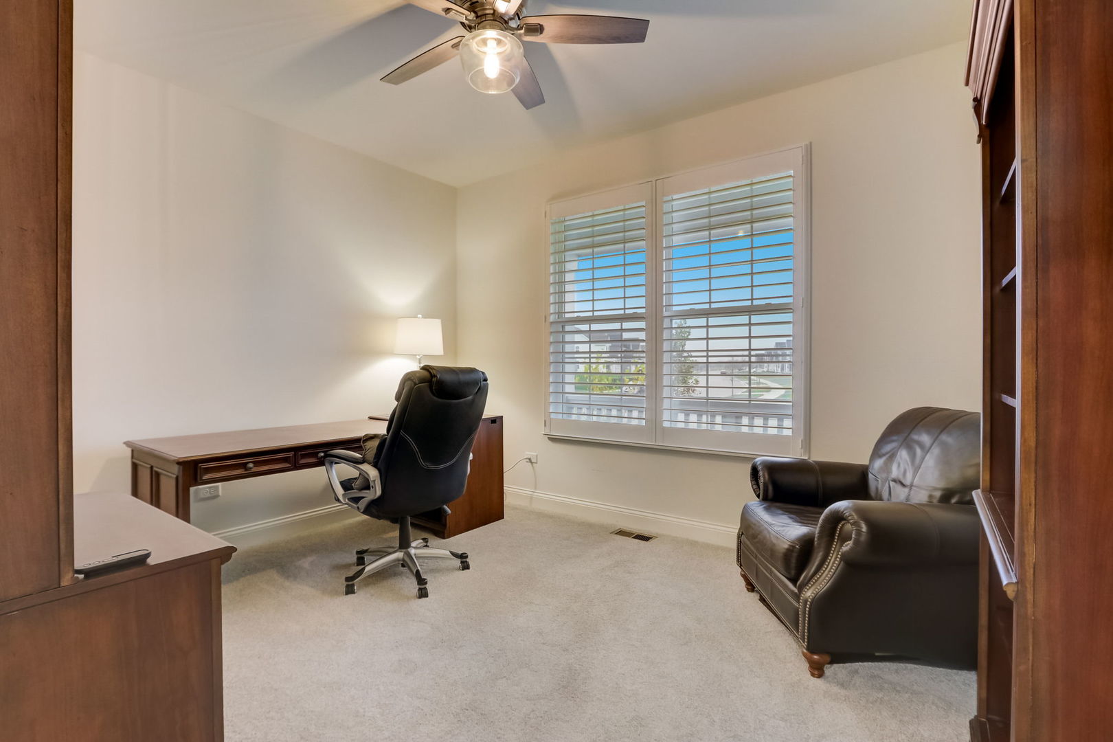 3630 Edelweiss Road Elgin, IL 60124 - Photo 19 of 47 a living room with furniture and a window