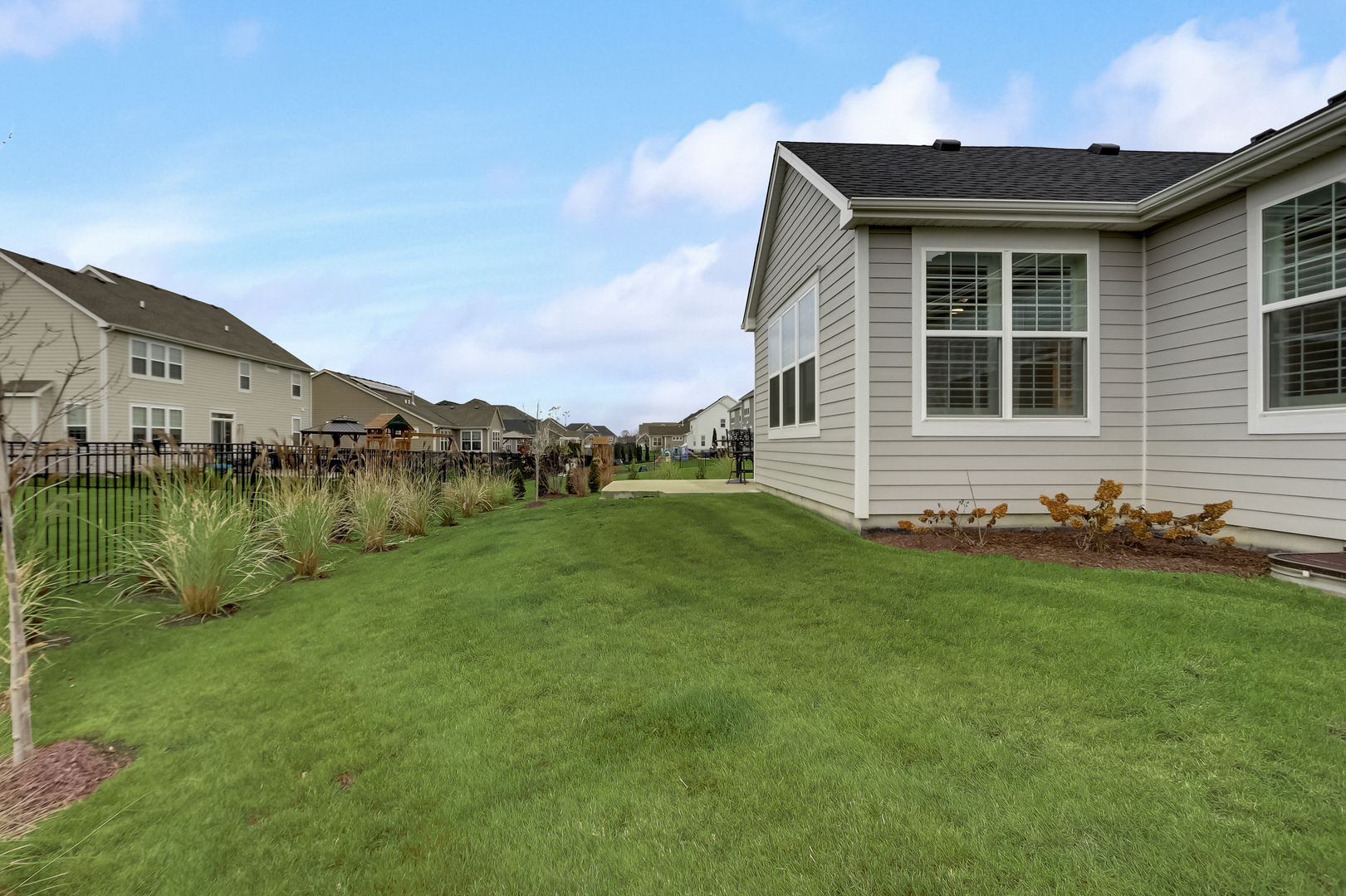 3630 Edelweiss Road Elgin, IL 60124 - Photo 40 of 47 a front view of a house with a yard