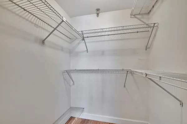 a view of a room with racks on the wall