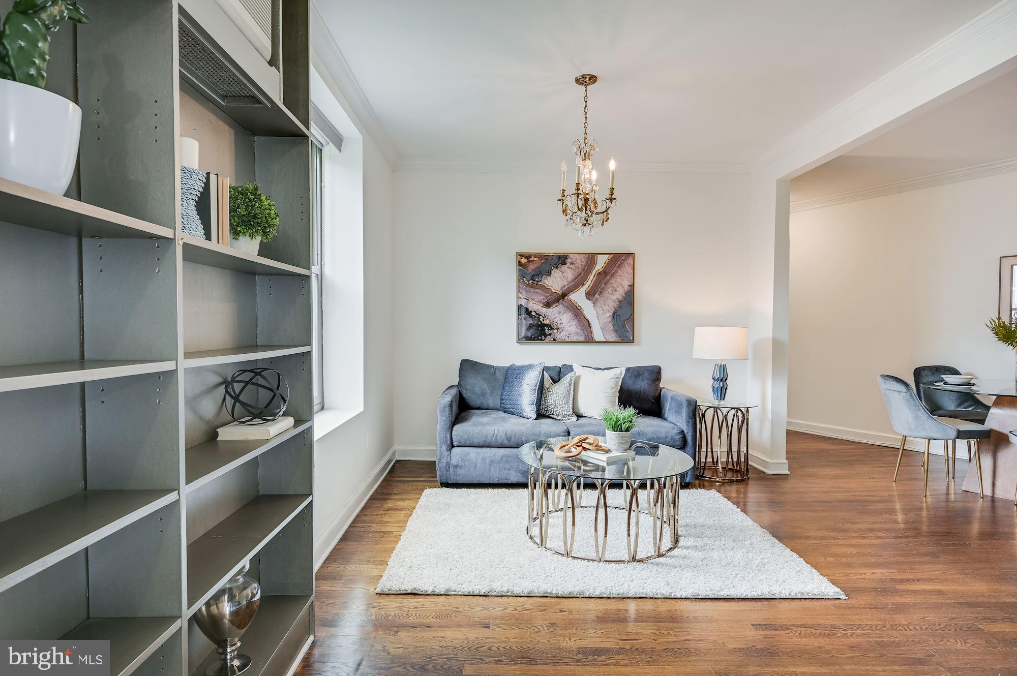 121 13th Street Northeast, Unit 201 Washington, DC 20002 - Photo 3 of 15 Front entry with built-ins and hall closet