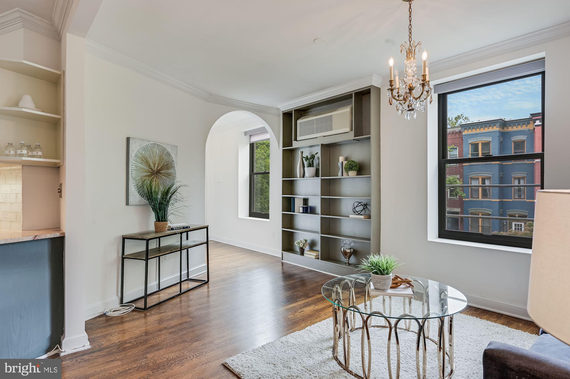 121 13th Street Northeast, Unit 201 Washington, DC 20002 - Photo 4 of 15 Sun-lit living room