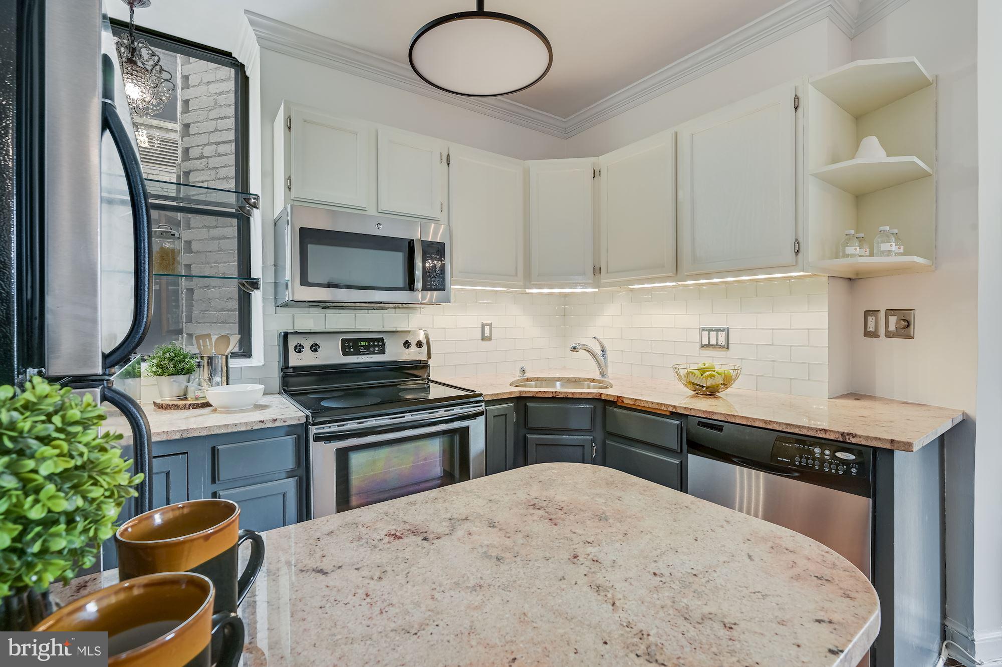 121 13th Street Northeast, Unit 201 Washington, DC 20002 - Photo 7 of 15 Kitchen island