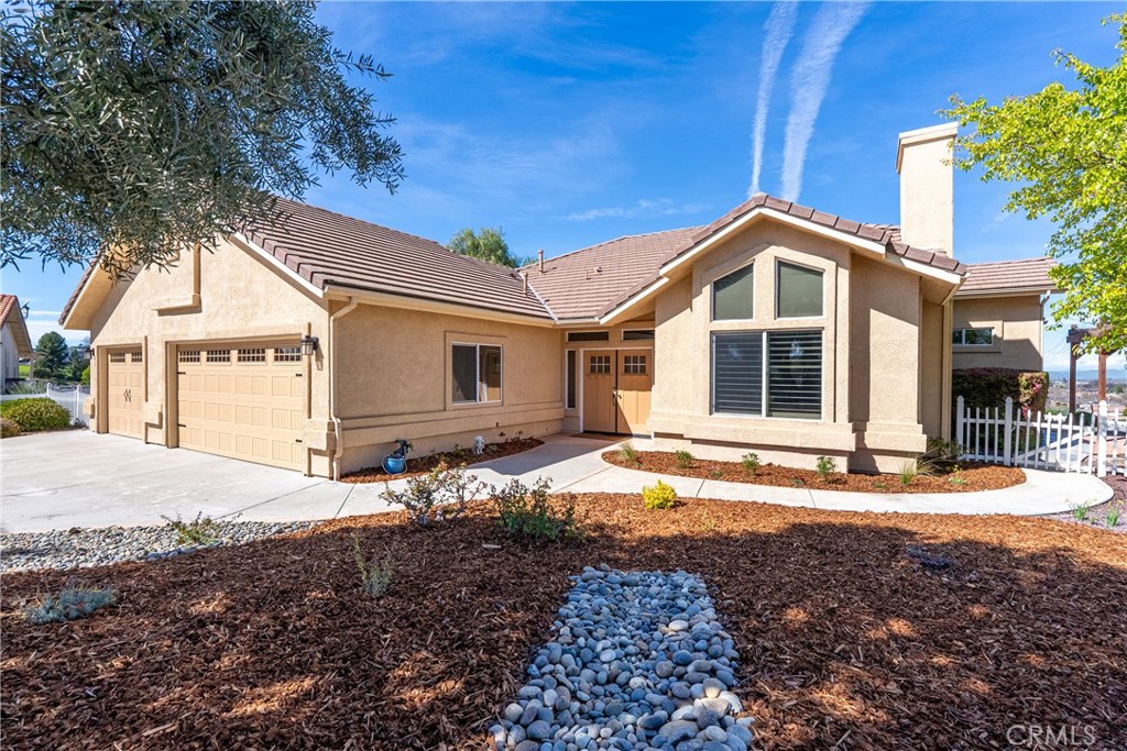 2039 Promontory Place Paso Robles, CA 93446 - Photo 1 of 1 a front view of a house with a yard