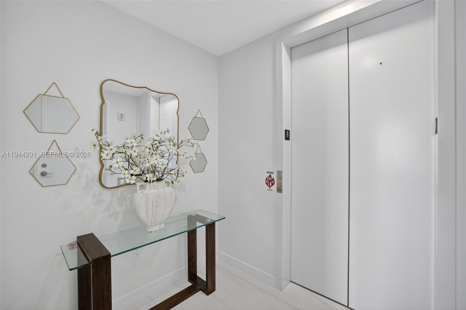 900 North Ocean Boulevard, Unit 906 Pompano Beach, FL 33062 - Photo 12 of 100 Foyer entry off the semi-private elevator