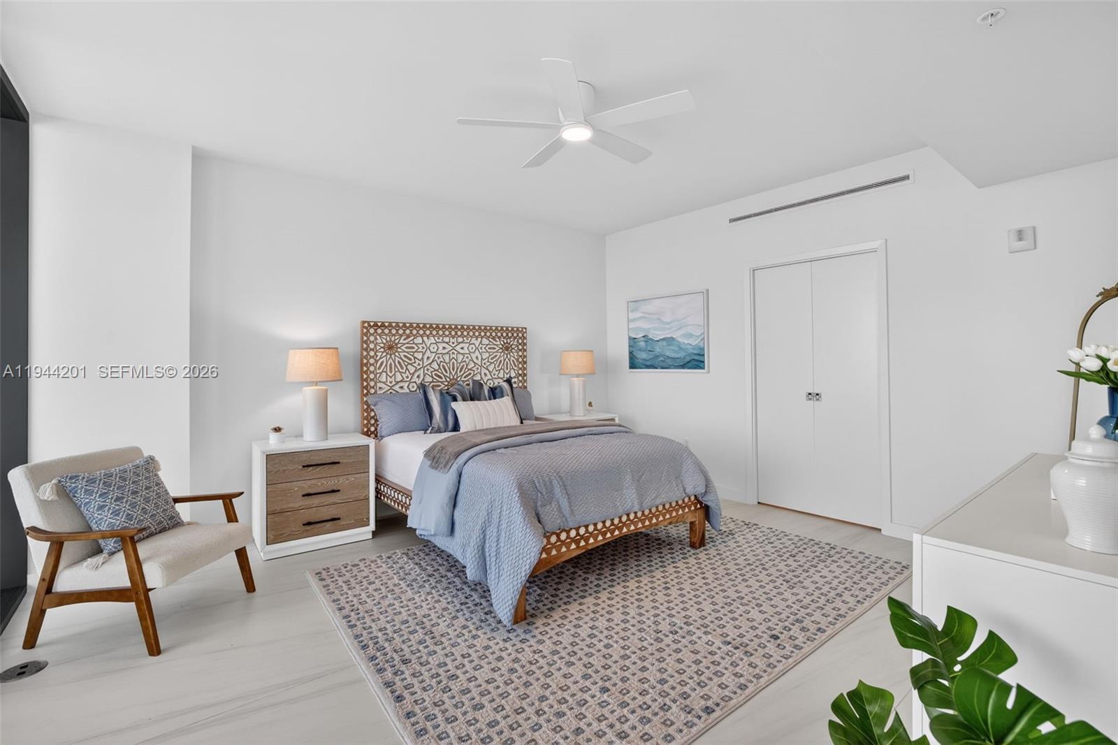 900 North Ocean Boulevard, Unit 906 Pompano Beach, FL 33062 - Photo 29 of 100 Spacious primary suite with floor to ceiling glass, terrace access, two walk in closets, and spa inspired bath.