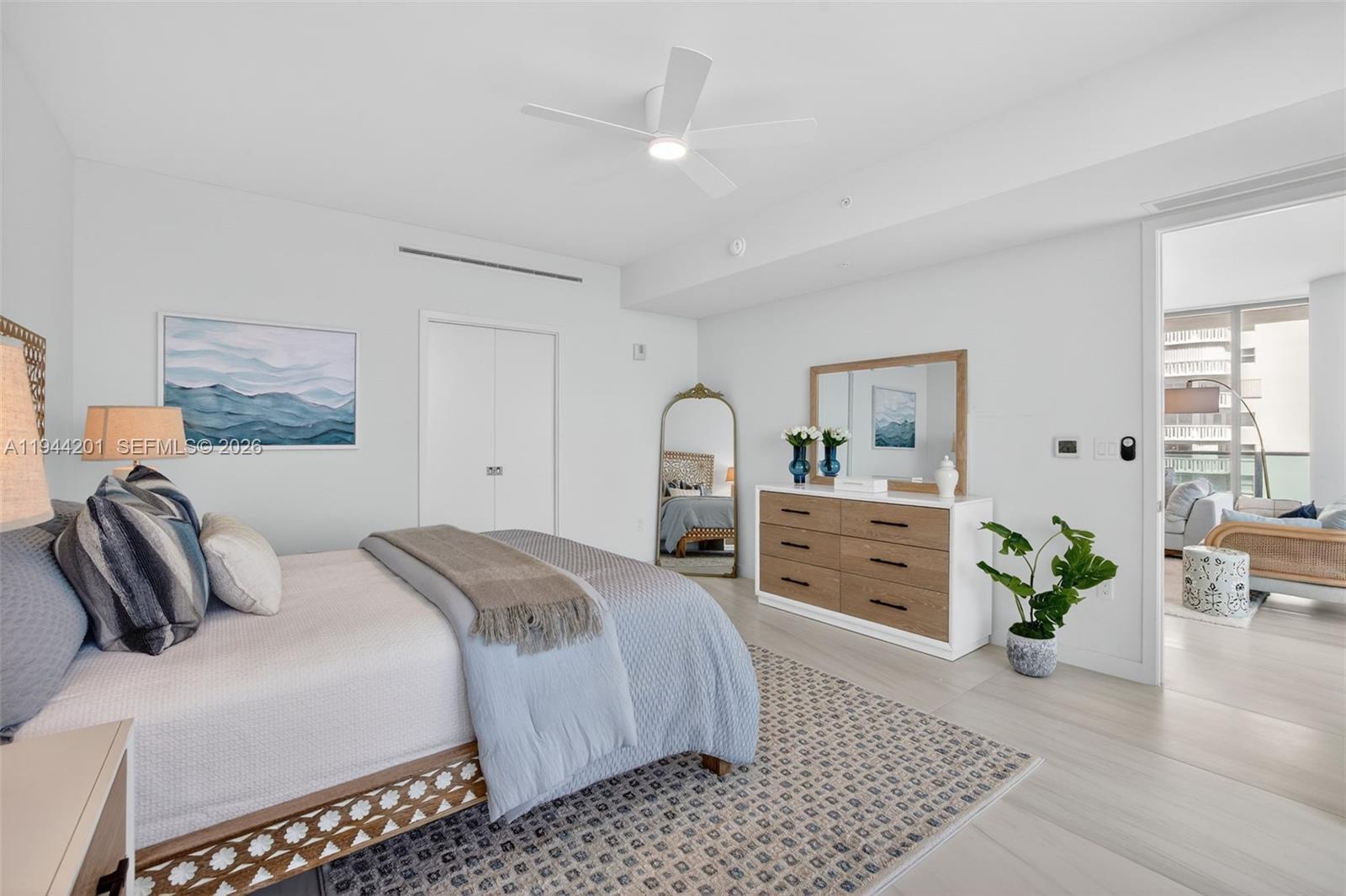 900 North Ocean Boulevard, Unit 906 Pompano Beach, FL 33062 - Photo 31 of 100 Spacious primary suite with floor to ceiling glass, terrace access, two walk in closets, and spa inspired bath.