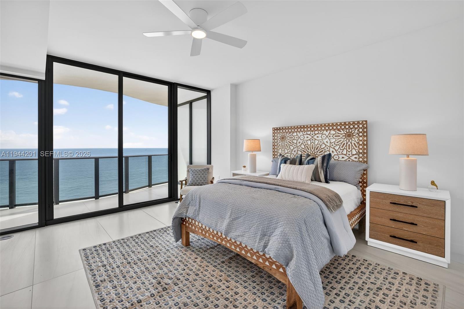 900 North Ocean Boulevard, Unit 906 Pompano Beach, FL 33062 - Photo 33 of 100 Spacious primary suite with floor to ceiling glass, terrace access, two walk in closets, and spa inspired bath.