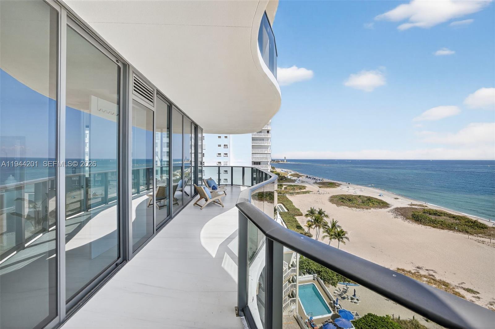 900 North Ocean Boulevard, Unit 906 Pompano Beach, FL 33062 - Photo 46 of 100 View from Primary Bedroom to the North - super long 34 ft balcony on this side.
