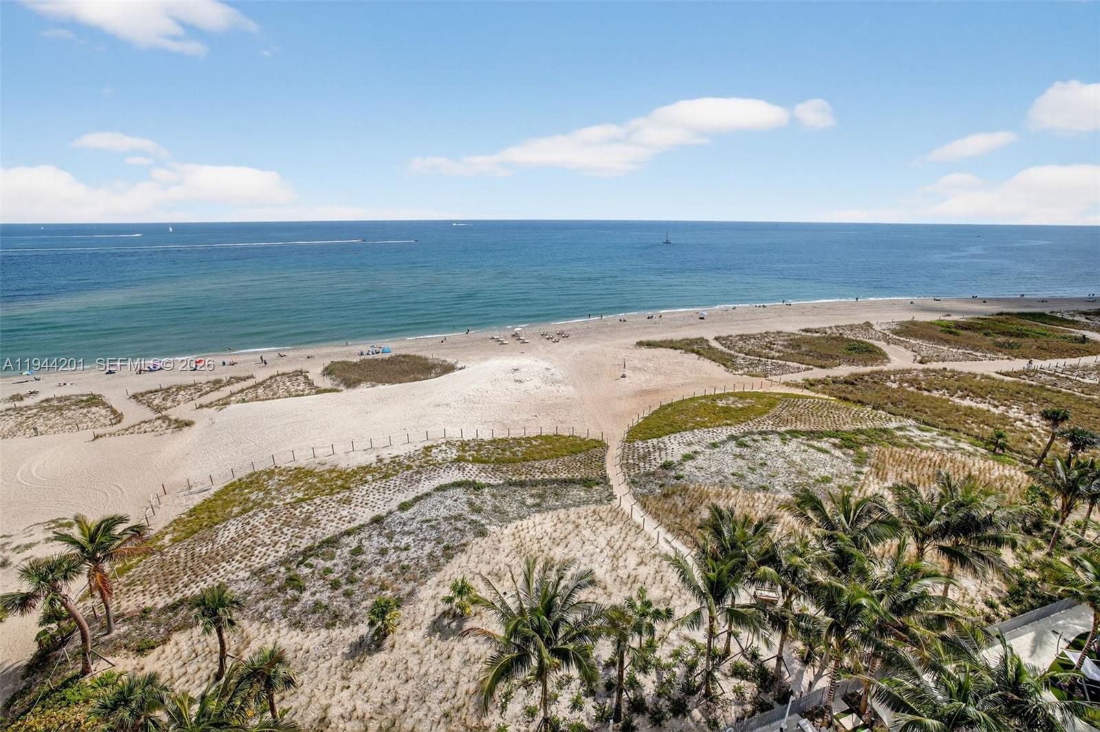 900 North Ocean Boulevard, Unit 906 Pompano Beach, FL 33062 - Photo 48 of 100 Grounds of Casamar and the dunes & Beach beyond the building.