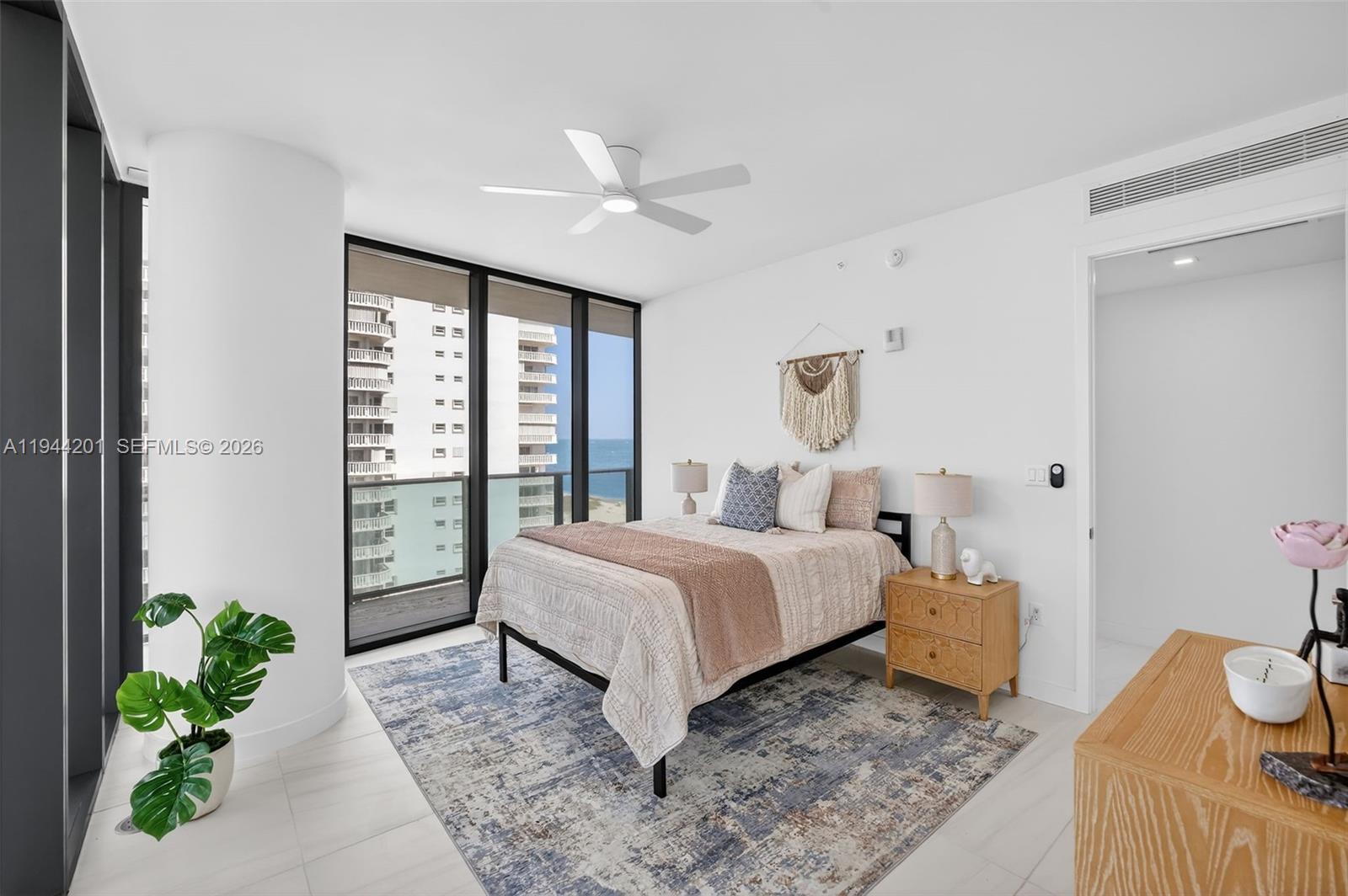 900 North Ocean Boulevard, Unit 906 Pompano Beach, FL 33062 - Photo 50 of 100 Guest Bedroom #2 - ensuite bathroom w/ walk in closet, w/ wrap around balcony and views to the west and north