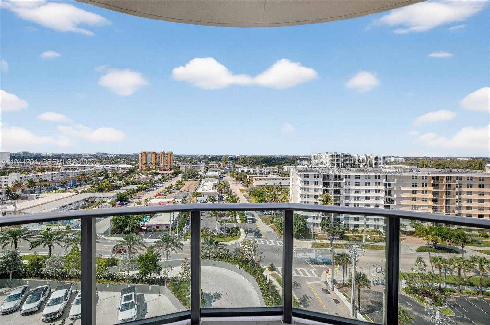 900 North Ocean Boulevard, Unit 906 Pompano Beach, FL 33062 - Photo 59 of 100 view west - building being painted white