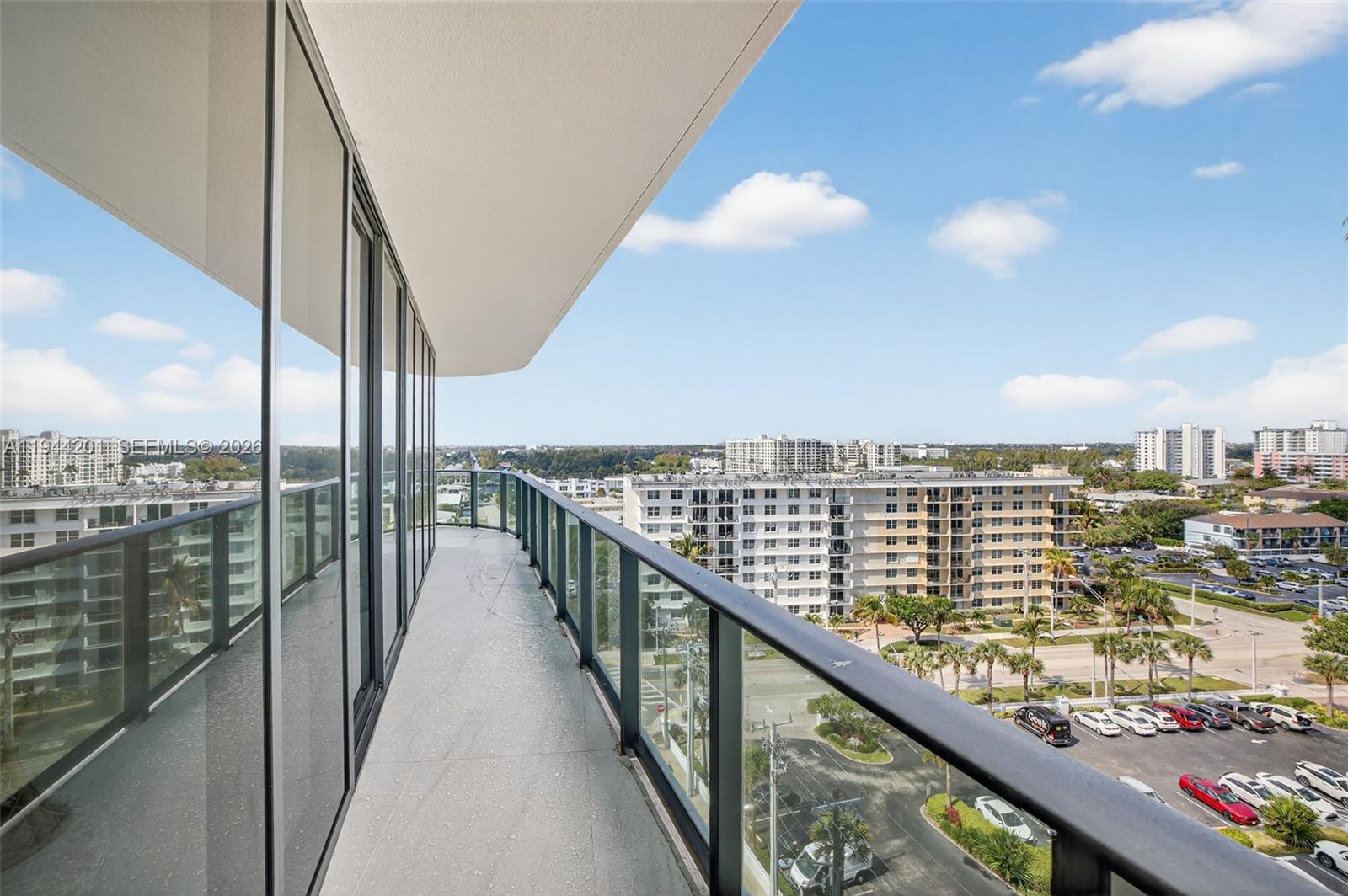 900 North Ocean Boulevard, Unit 906 Pompano Beach, FL 33062 - Photo 61 of 100 View toward the west from the North side balcony. Building in vacinity is being painted white.