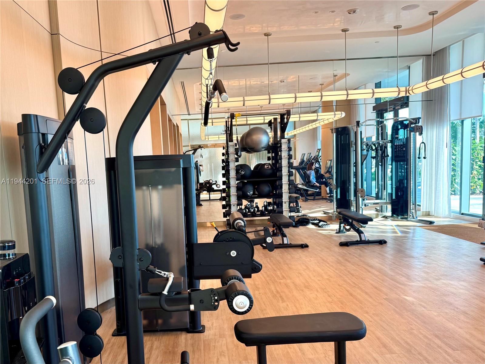 900 North Ocean Boulevard, Unit 906 Pompano Beach, FL 33062 - Photo 99 of 100 Fitness Center overlooking pool area on beach side