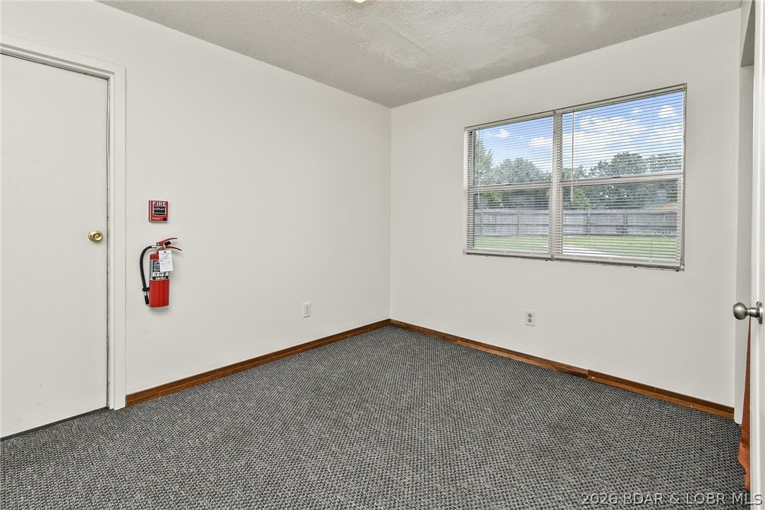 194 State Hwy MM Niangua, MO 65713 - Photo 23 of 32 Bedroom #7 with two closets and outside door