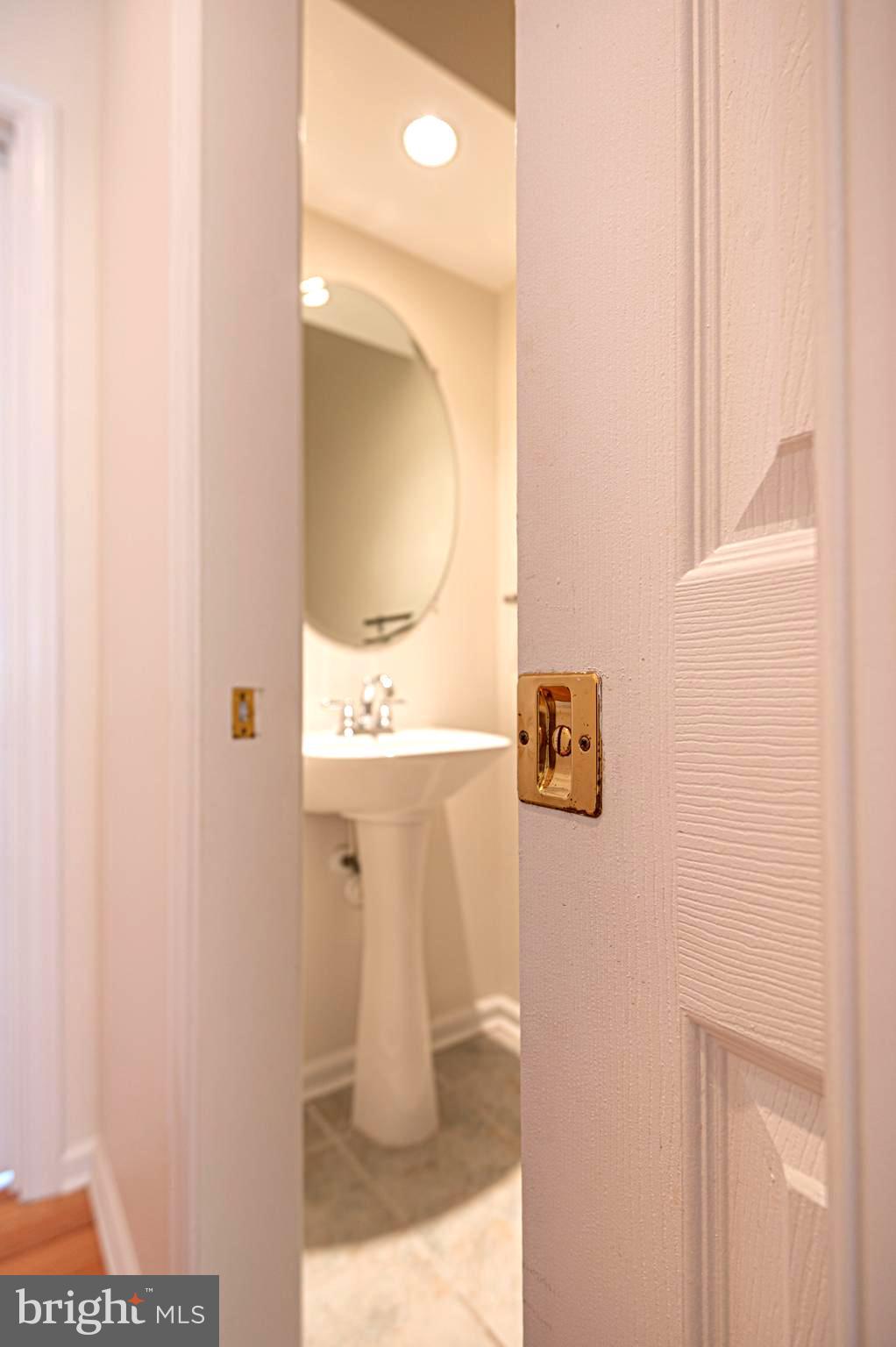 117 Windjammer Road Ocean Pines, MD 21811 - Photo 33 of 69 Powder room on 1st fl. with pocket door