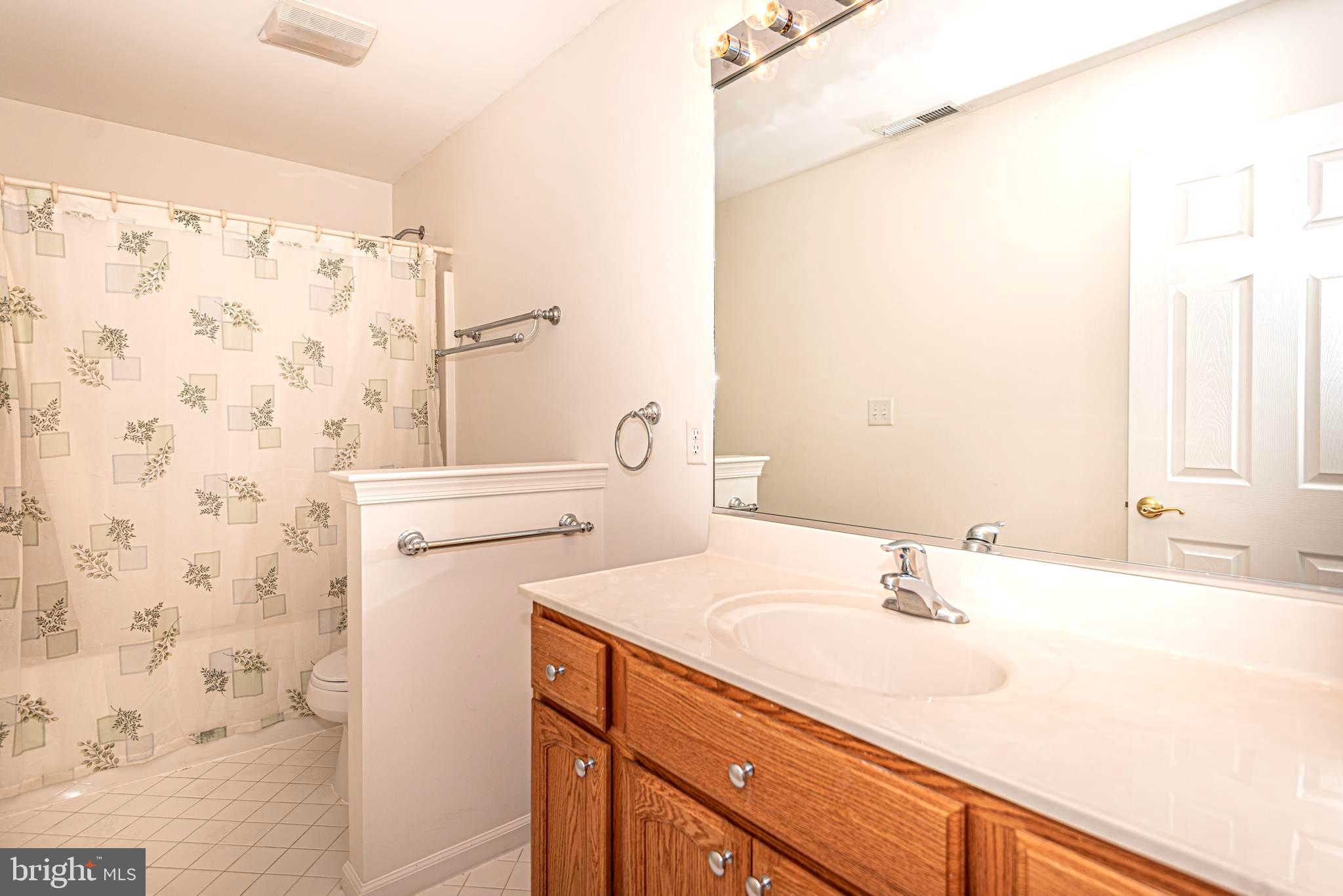 117 Windjammer Road Ocean Pines, MD 21811 - Photo 53 of 69 Hall bath between loft & BR #4 w/tile floors