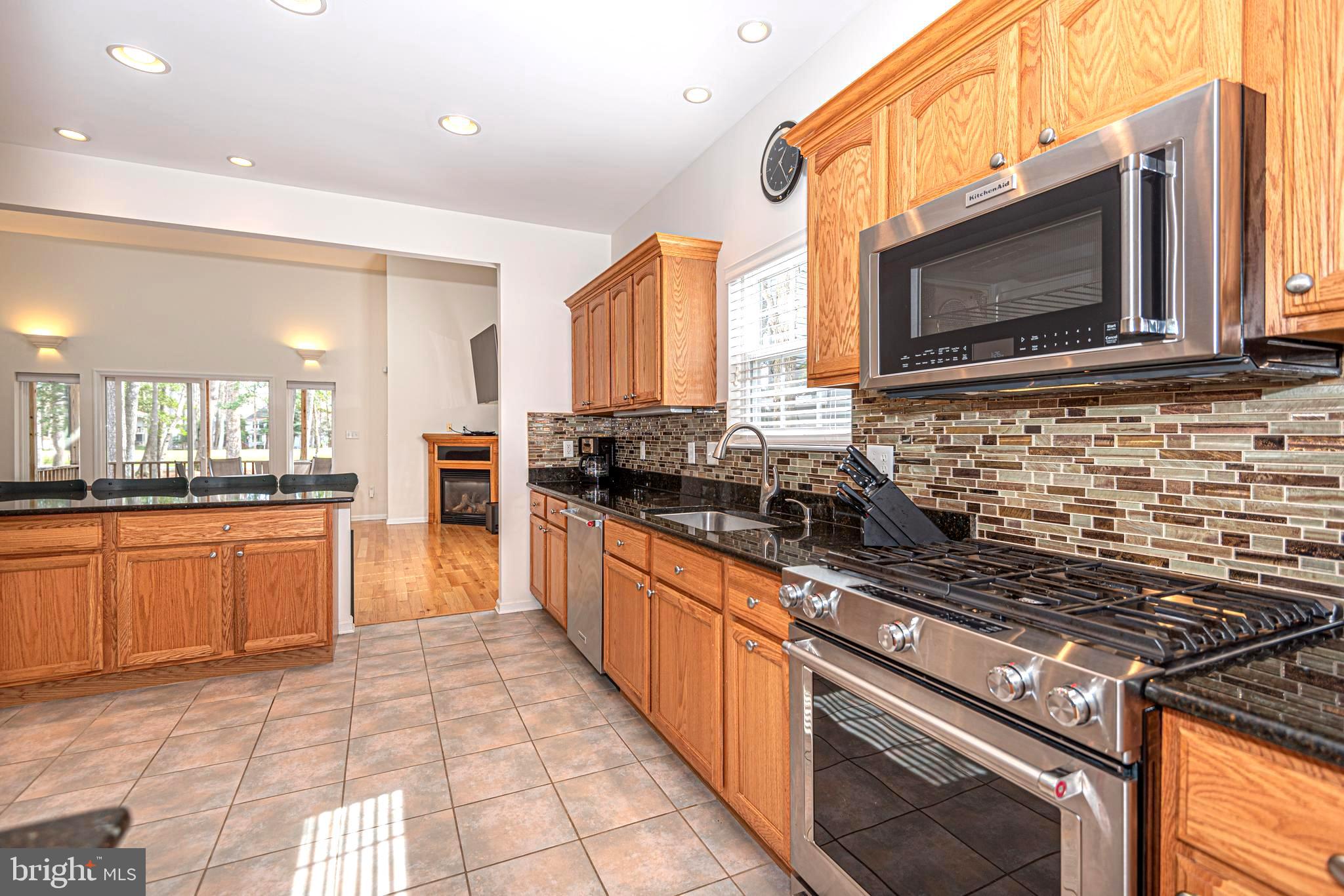 117 Windjammer Road Ocean Pines, MD 21811 - Photo 9 of 69 6 burner gas stove & under cabinet lighting
