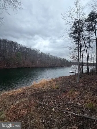 a backyard of a house with lots of green space and fog