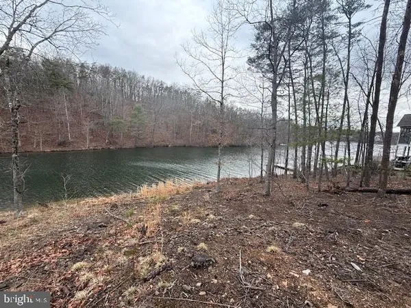 a view of a backyard of the house