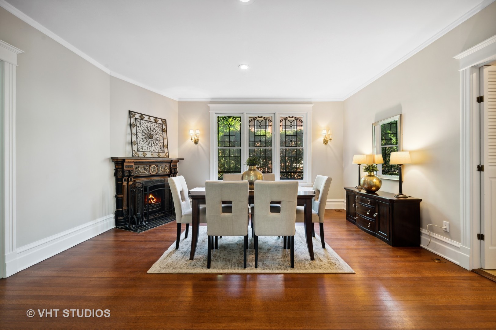615 Elm Street Winnetka, IL 60093 - Photo 13 of 43 a dining room with furniture window and wooden floor
