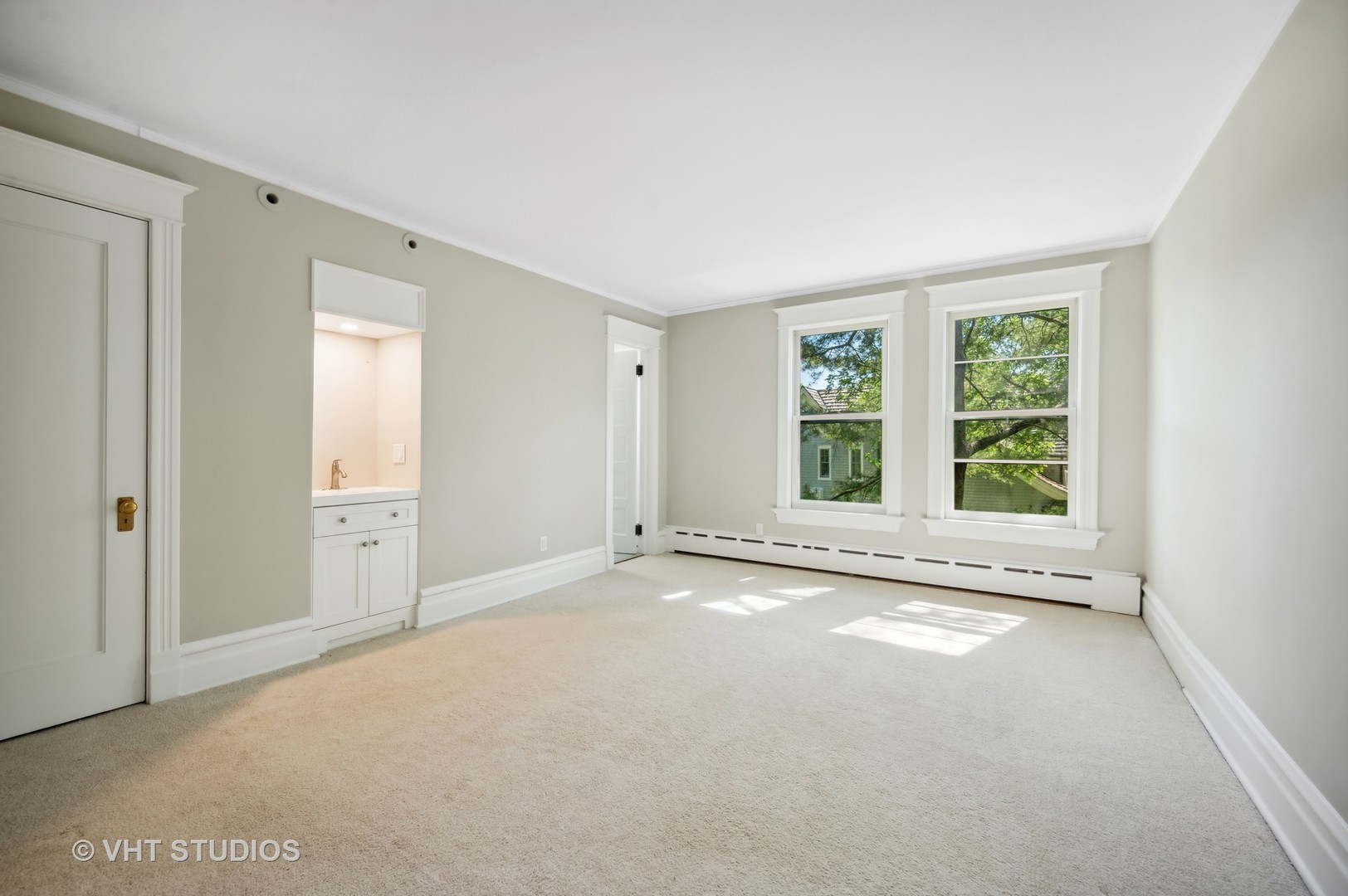615 Elm Street Winnetka, IL 60093 - Photo 18 of 43 a view of an empty room with a window