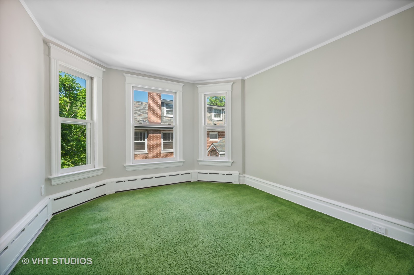 615 Elm Street Winnetka, IL 60093 - Photo 20 of 43 a view of an empty room with a window