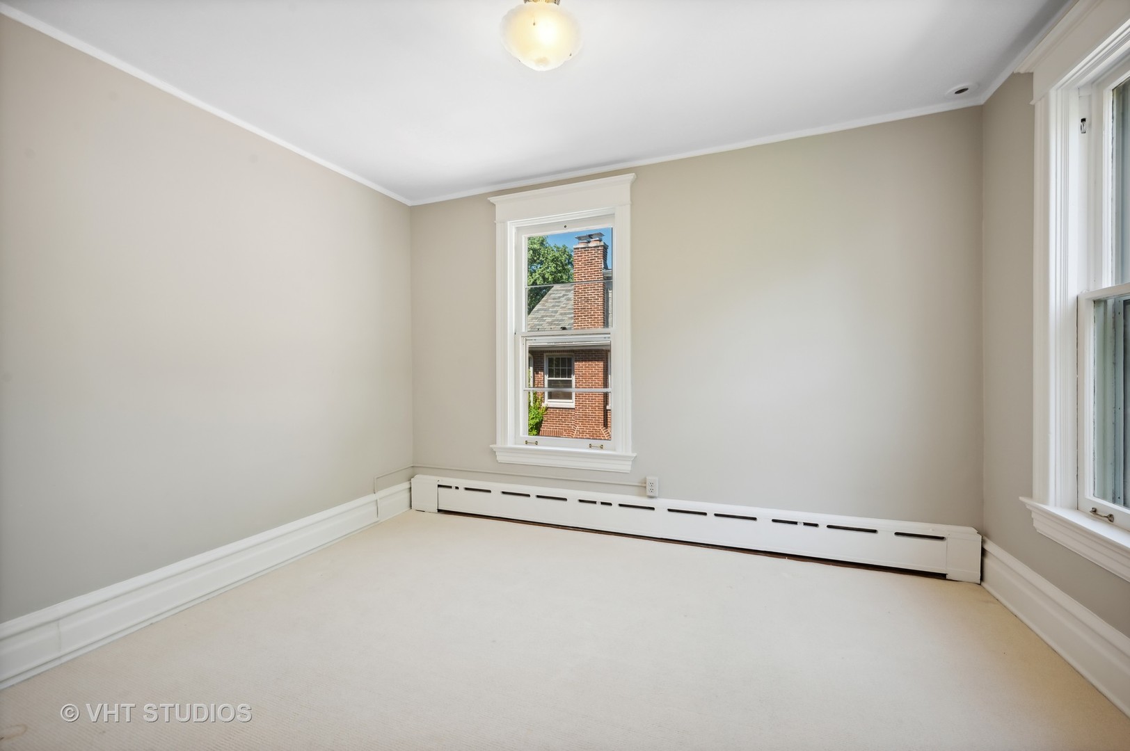 615 Elm Street Winnetka, IL 60093 - Photo 21 of 43 an empty room with windows