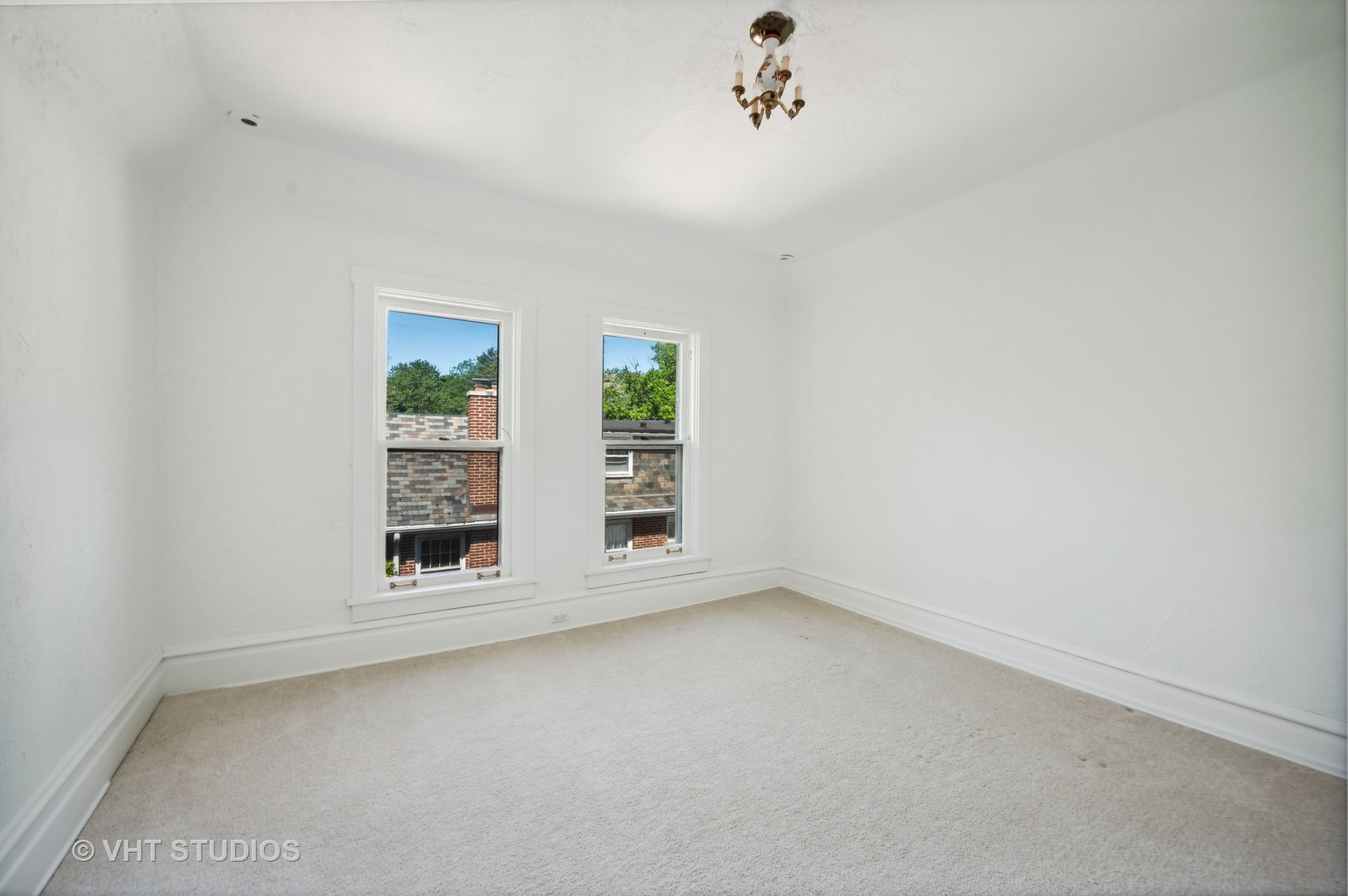 615 Elm Street Winnetka, IL 60093 - Photo 23 of 43 an empty room with windows