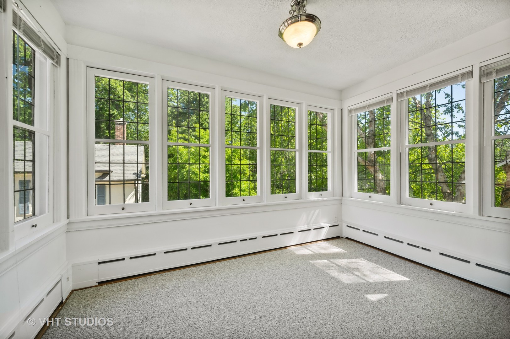 615 Elm Street Winnetka, IL 60093 - Photo 26 of 43 a view of an empty room with a window