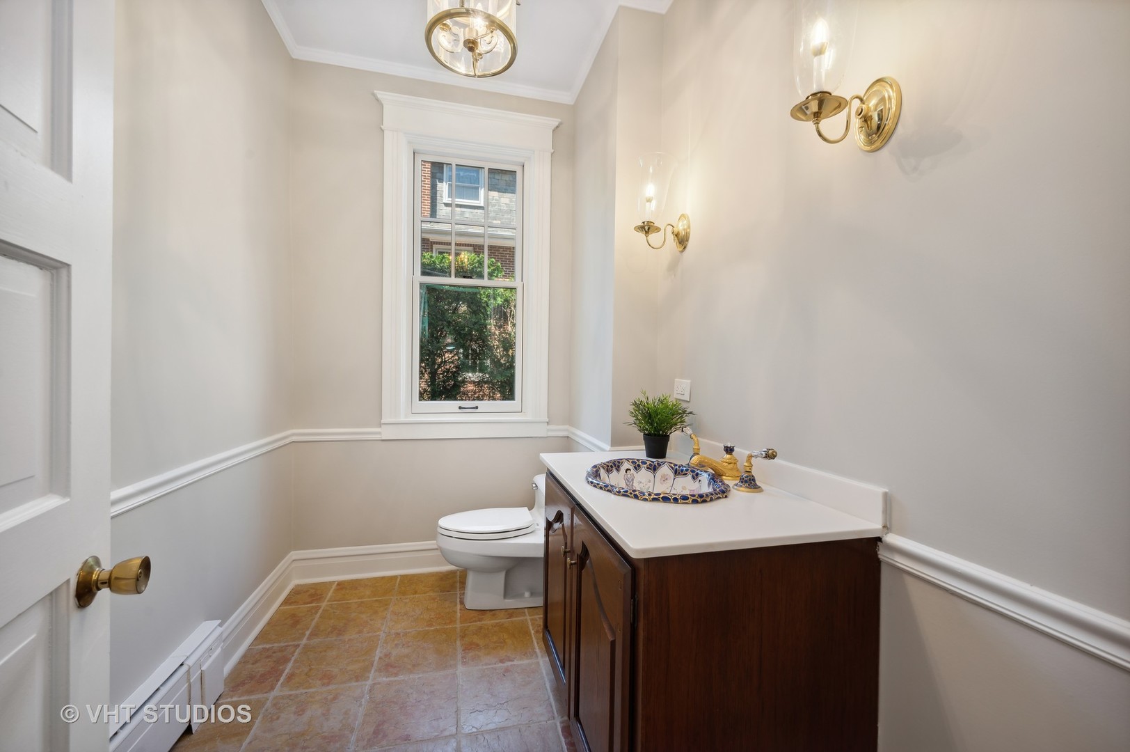615 Elm Street Winnetka, IL 60093 - Photo 30 of 43 a bathroom with a sink vanity granite and toilet