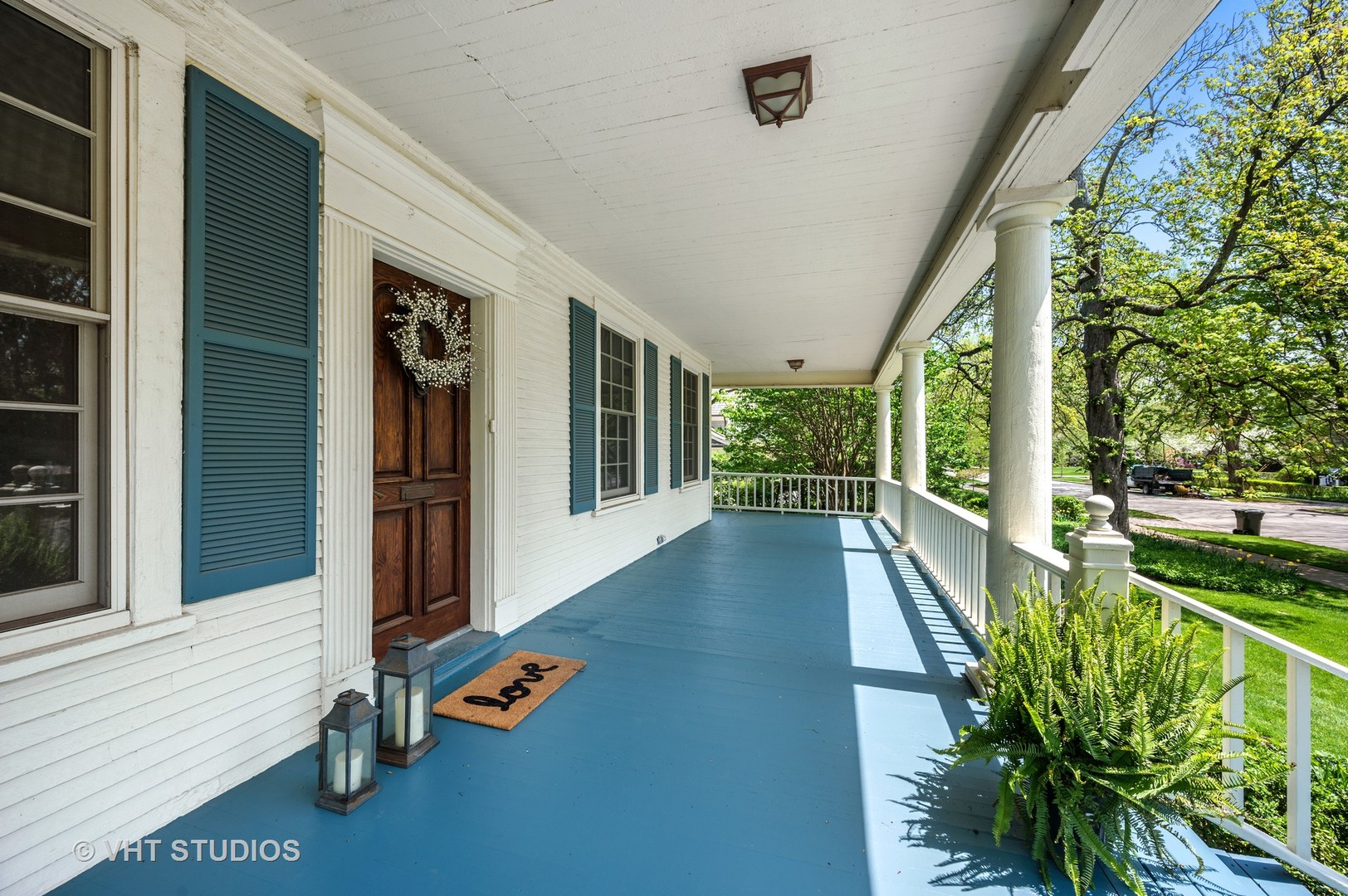 615 Elm Street Winnetka, IL 60093 - Photo 7 of 43 view of balcony with couch and wooden floor