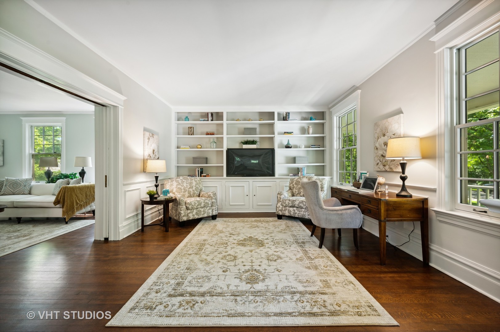 615 Elm Street Winnetka, IL 60093 - Photo 9 of 43 a living room with furniture and a large window