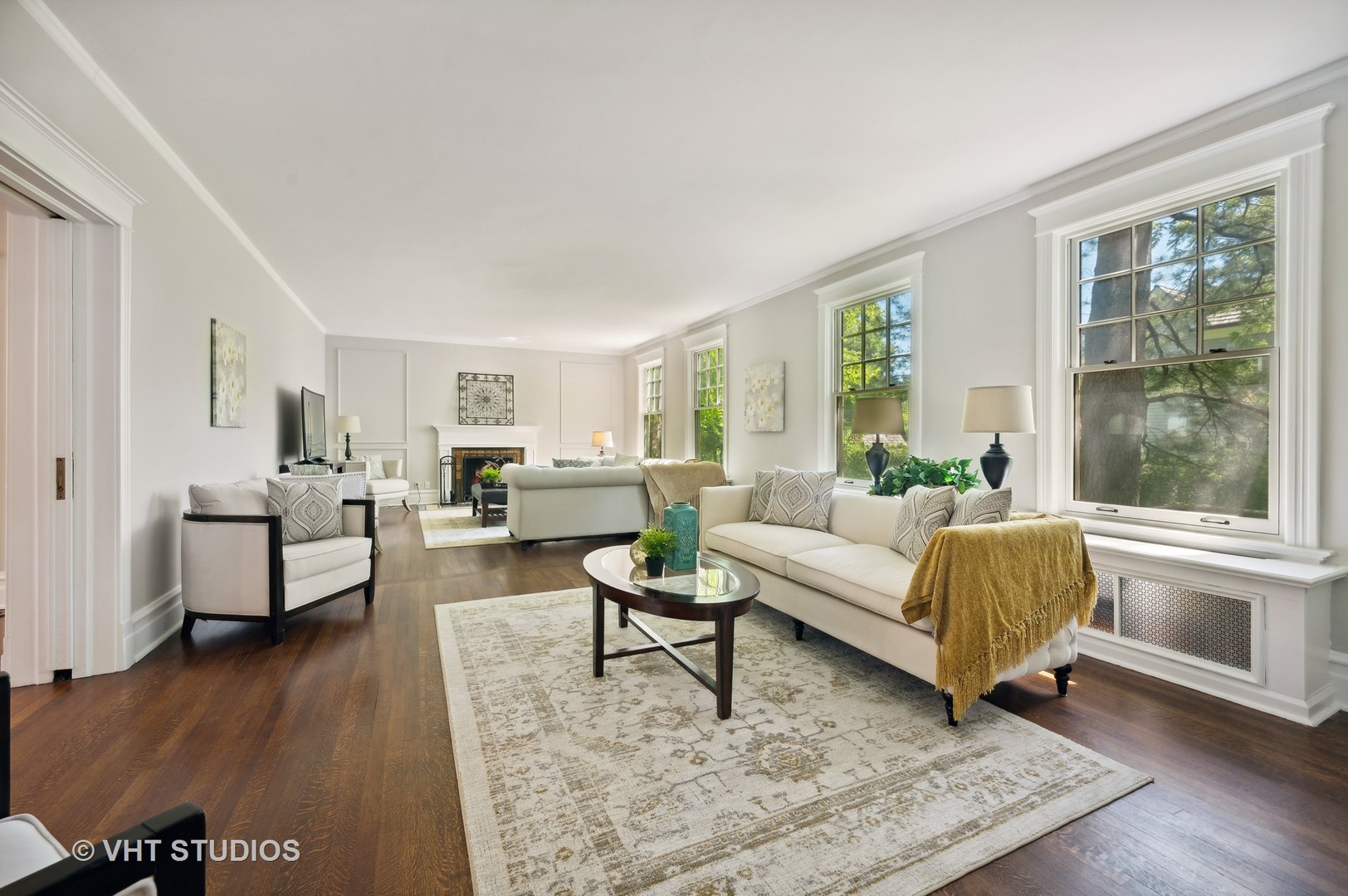 615 Elm Street Winnetka, IL 60093 - Photo 10 of 43 a living room with furniture and a large window