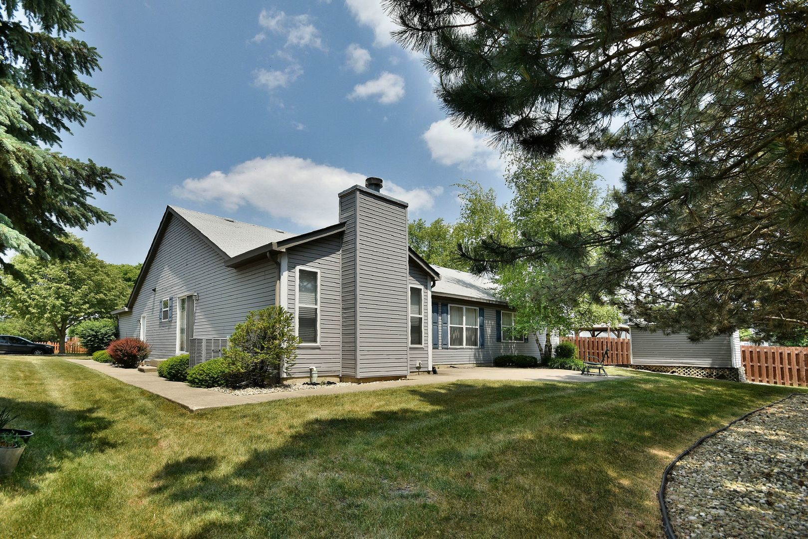 1741 Crofton Drive Algonquin, IL 60102 - Photo 32 of 32 a front view of a house with a yard and a garage