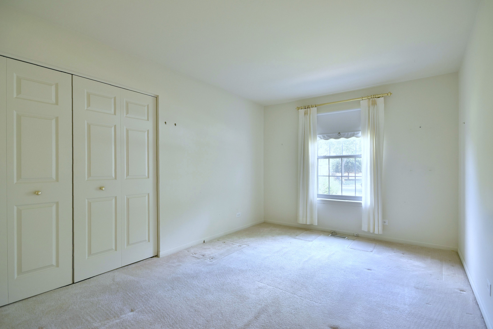 1741 Crofton Drive Algonquin, IL 60102 - Photo 9 of 32 a view of an empty room with a window