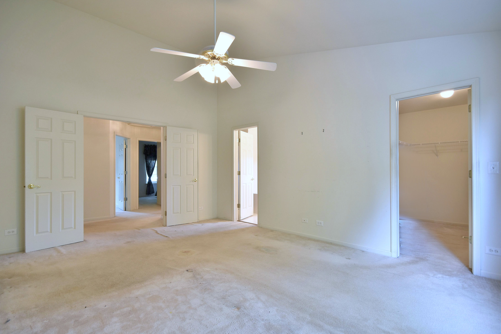 1741 Crofton Drive Algonquin, IL 60102 - Photo 10 of 32 a view of an empty room with a chandelier fan
