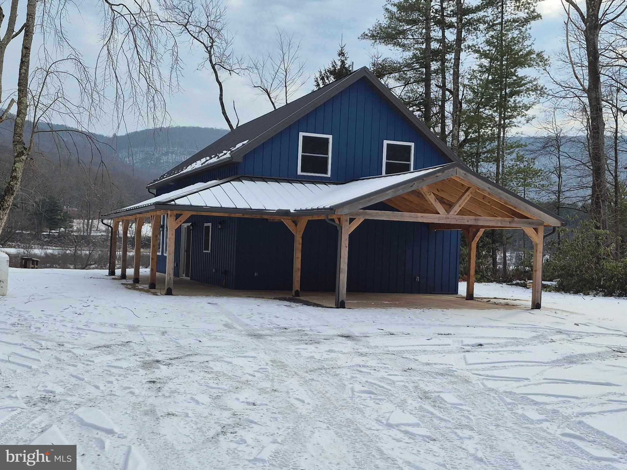 a house with trees in the background