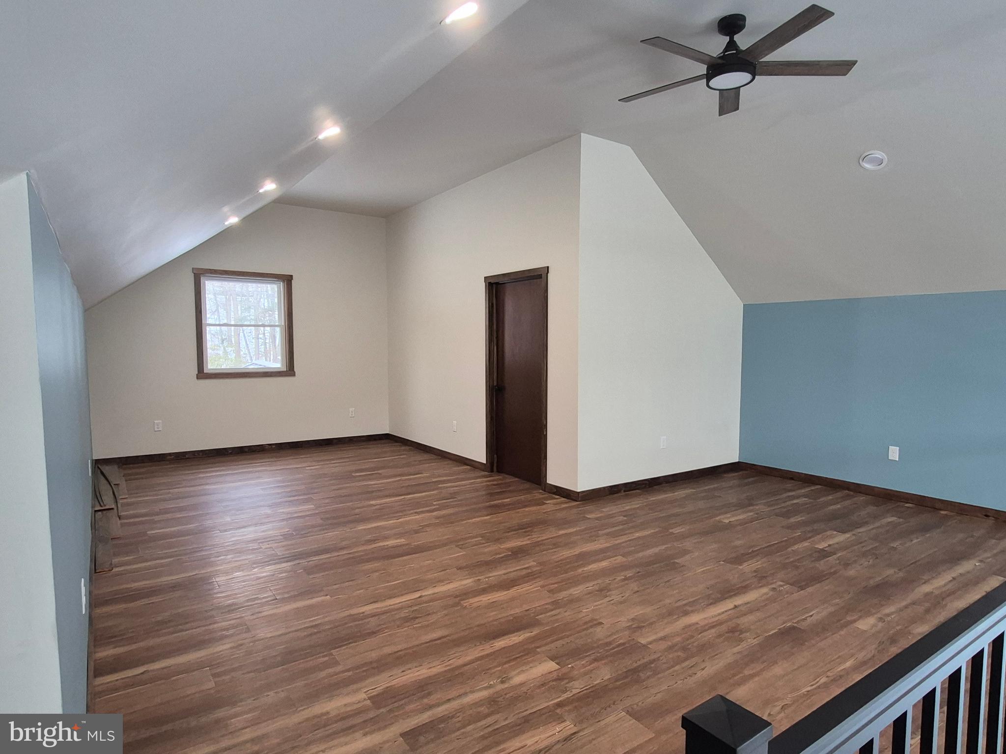 7144 Renovo Road Mill Hall, PA 17751 - Photo 21 of 27 a view of a room with wooden floor and window