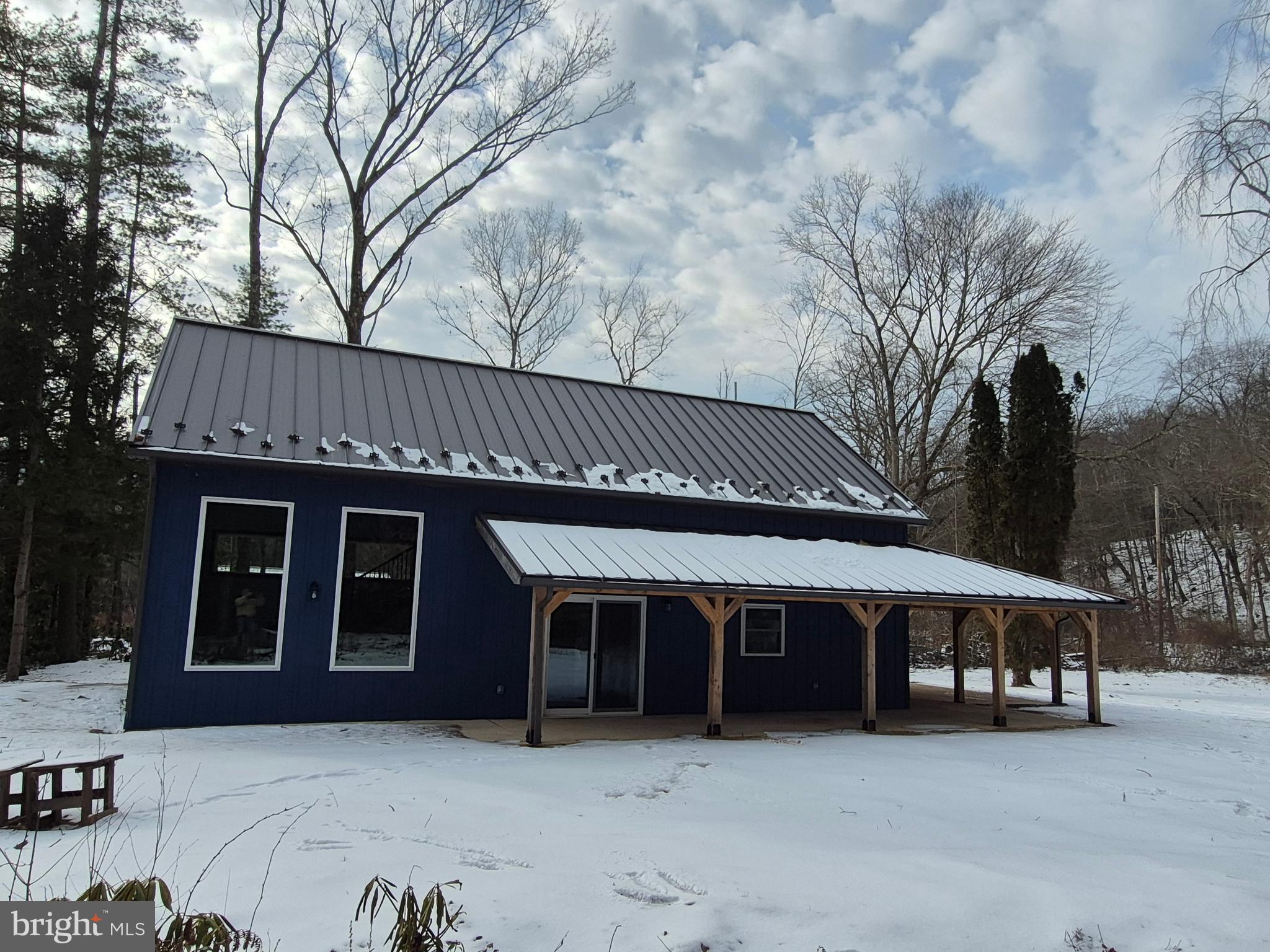 7144 Renovo Road Mill Hall, PA 17751 - Photo 3 of 27 a front view of a house with garage