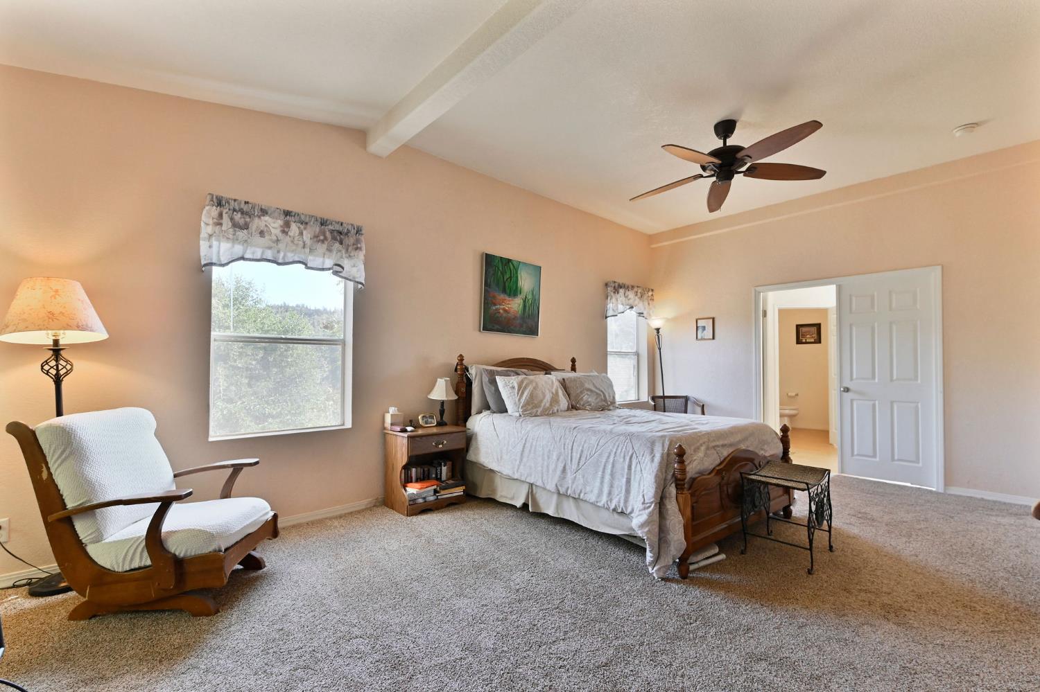 3770 Sheep Ranch Road Murphys, CA 95247 - Photo 21 of 92 a bed room with a bed and a chair