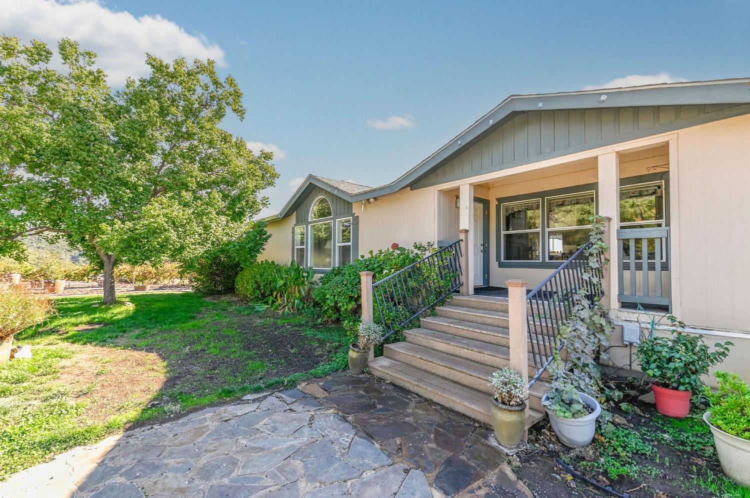 3770 Sheep Ranch Road Murphys, CA 95247 - Photo 44 of 92 a front view of a house with a yard