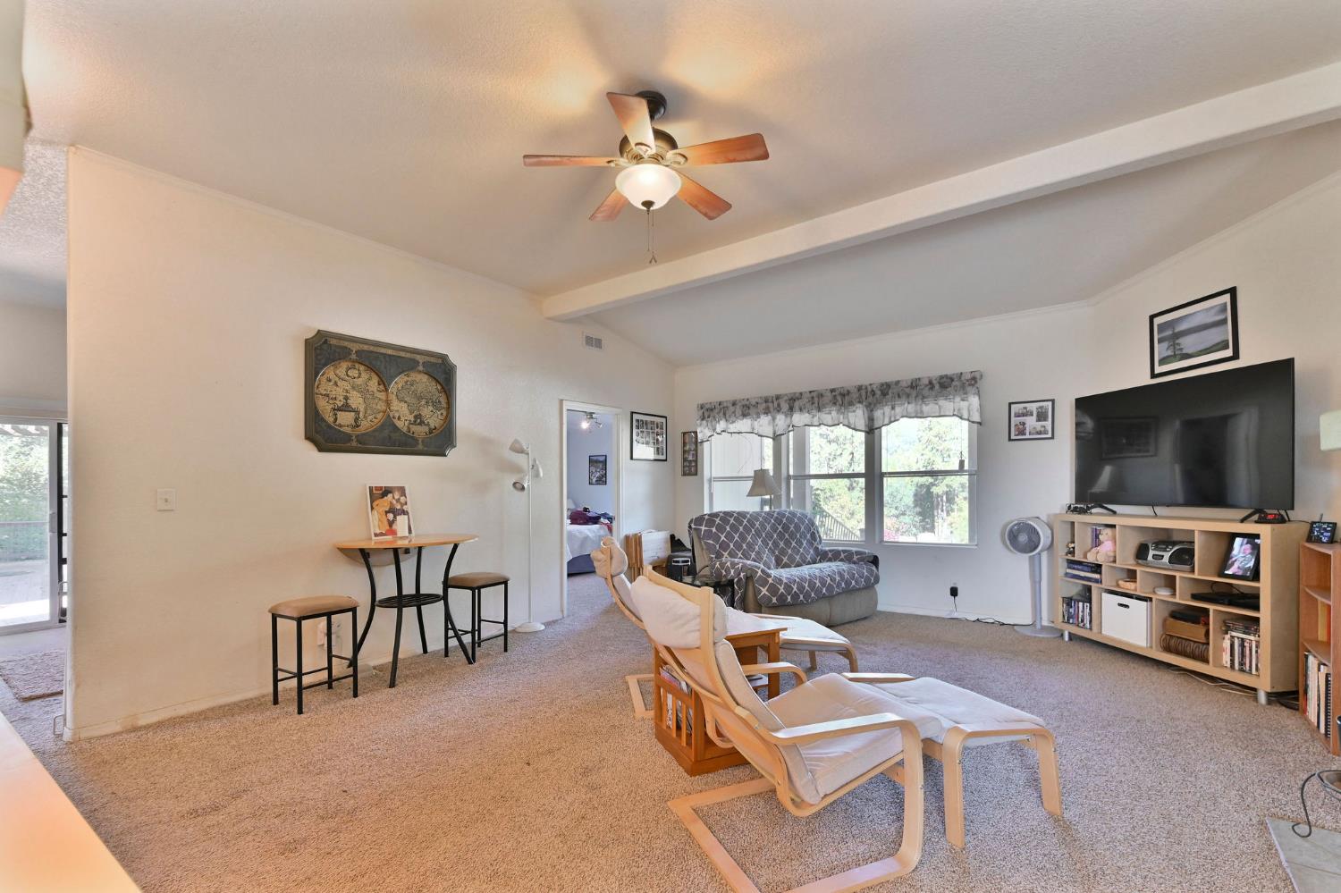 3770 Sheep Ranch Road Murphys, CA 95247 - Photo 6 of 92 a living room with furniture and a flat screen tv