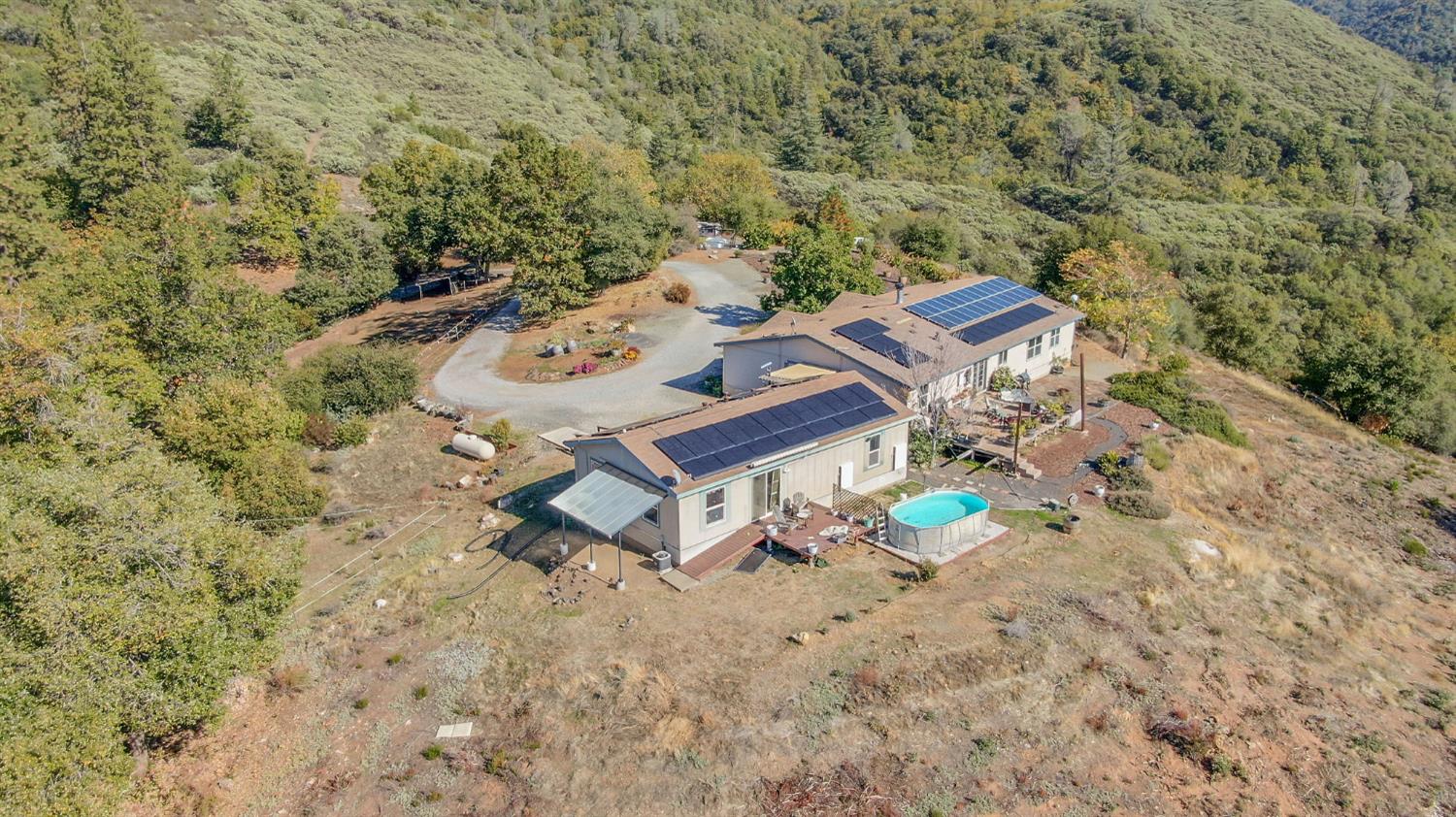 3770 Sheep Ranch Road Murphys, CA 95247 - Photo 79 of 92 an aerial view of a house with yard and outdoor seating